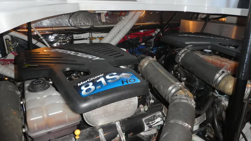 Slide: The Image of Engine room of a 2004 Larson 370 boat with MerCruiser 8.1S HO engines. - 30