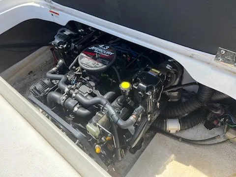 Slide: The Image of 2006 Larson 180 Bowrider SEI engine compartment with 3.0L MerCruiser engine. - 5