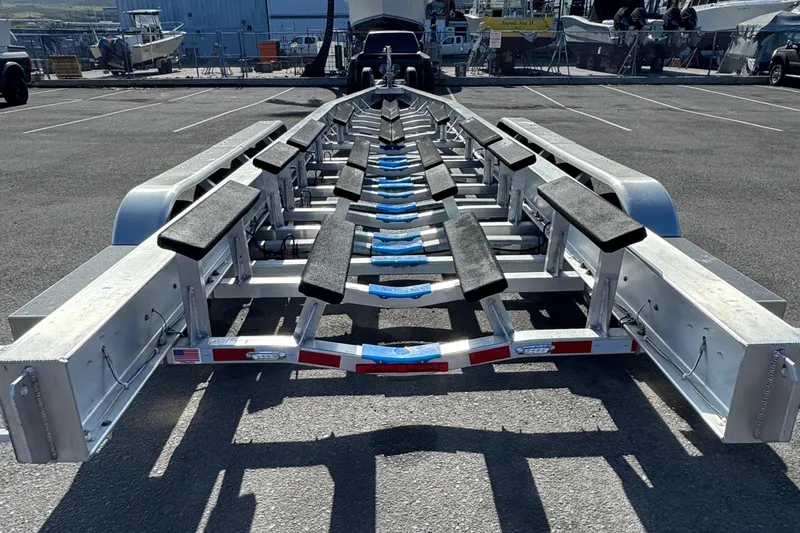 Slide: The Image of Trailer for 2022 Nor-Tech 450 Sport Center Console in parking lot. - 27