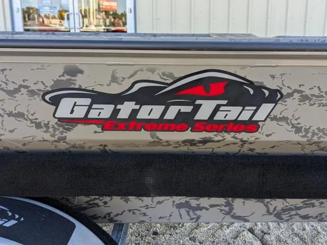 Slide: The Image of 2025 Gator Tail 1754 Extreme Series logo on camouflage-patterned boat exterior. - 10
