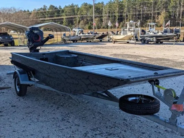 Slide: The Image of 2025 Gator Tail 1754 Extreme Series boat on trailer, parked outdoors. - 3