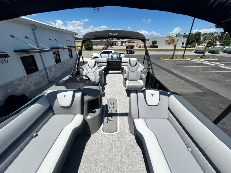 Slide: The Image of 2025 Tahoe LTZ QL25T pontoon boat with luxurious seating and modern design. - 22