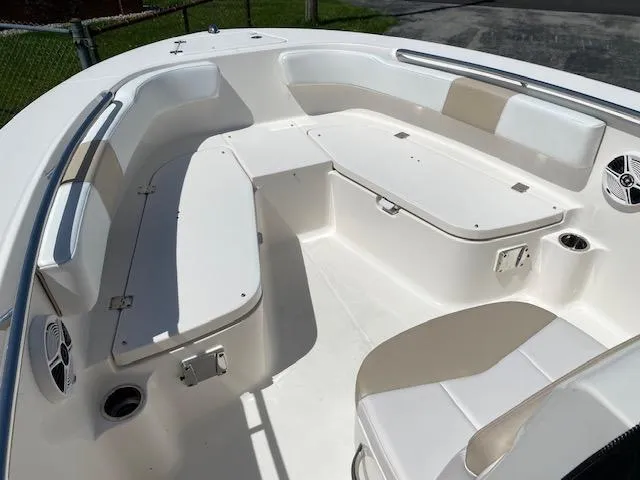 Slide: The Image of 2019 Robalo R200 Center Console boat interior with spacious seating and storage compartments. - 4