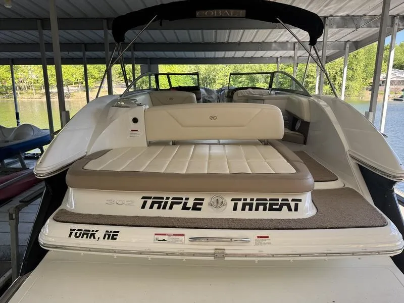 Slide: The Image of Engine compartment of a 2010 Cobalt 302 boat with Volvo Penta engine. - 4