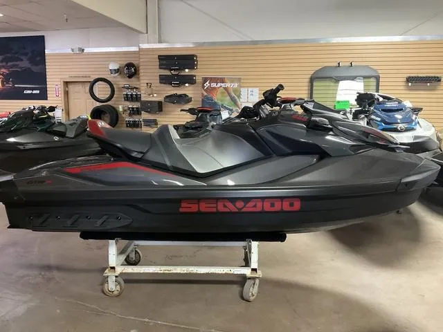 Slide: The Image of 2024 Sea-Doo Waverunner GTR-X 300 IBR on display in showroom. - 2