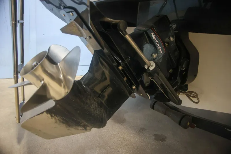Slide: The Image of 2007 Ebbtide 180SE Bowrider boat propeller and outdrive close-up. - 21