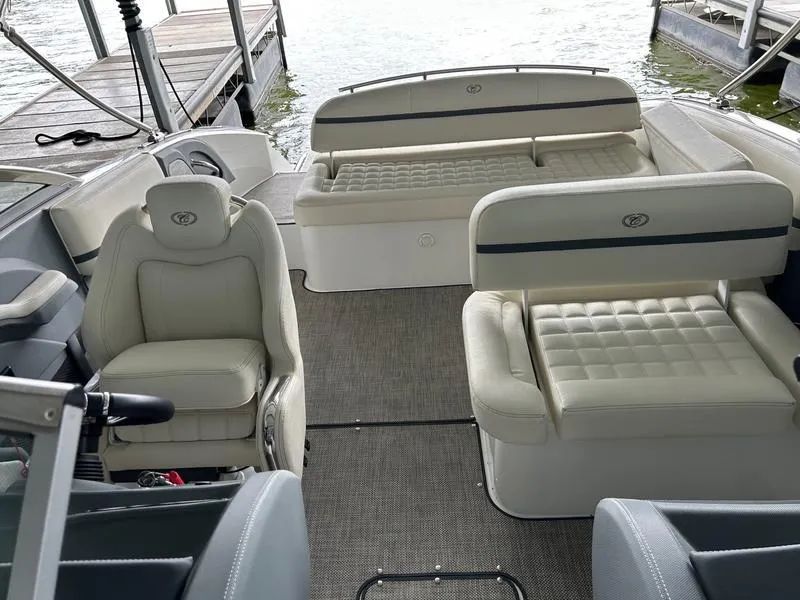 Slide: The Image of 2019 Cobalt R3 boat interior with plush seating and modern design. - 9