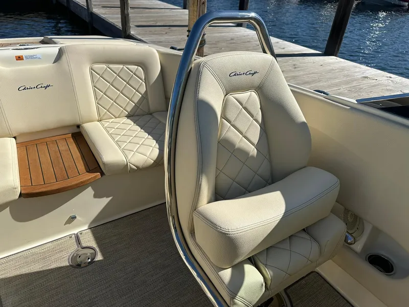 Slide: The Image of Luxurious interior of 2022 Chris-Craft Launch 23 boat with quilted seats. - 20