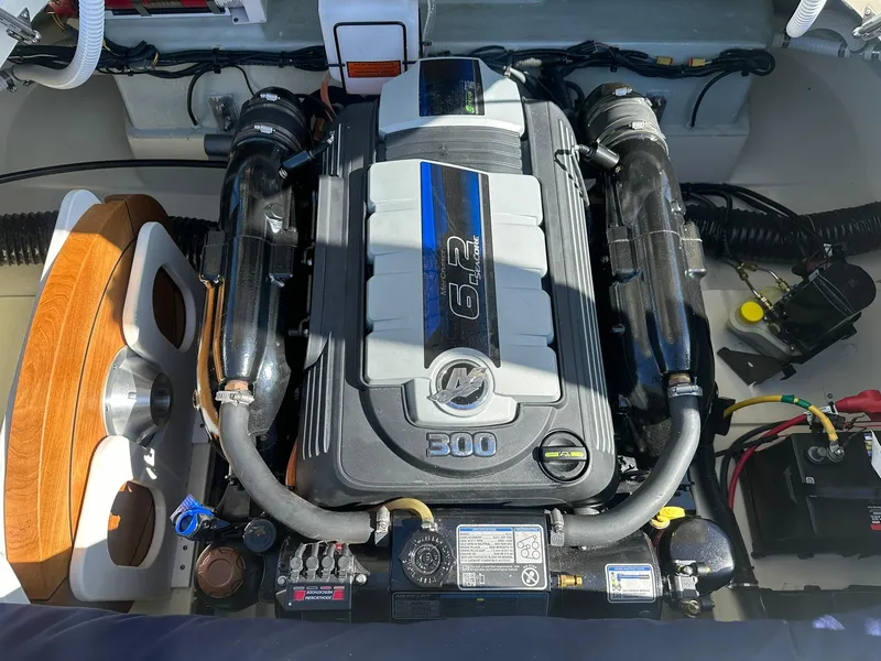 Slide: The Image of 2022 Chris-Craft Launch 23 engine compartment with a powerful 6.2L Mercury engine. - 22