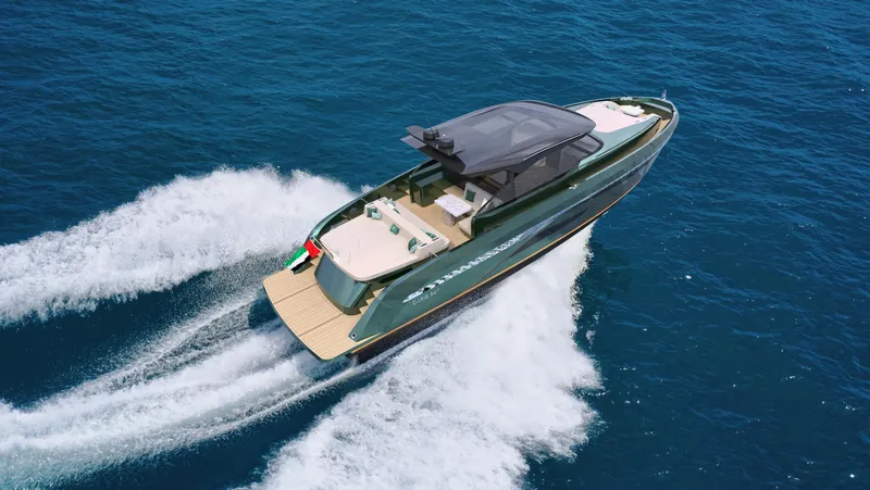 Slide: The Image of 2026 Bekkers Yachts CARIB 64HT cruising on open sea, showcasing sleek design and luxury. - 12