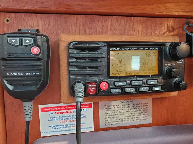 Slide: The Image of Standard Horizon marine radio on 2002 Hunter 380 sailboat dashboard. - 14