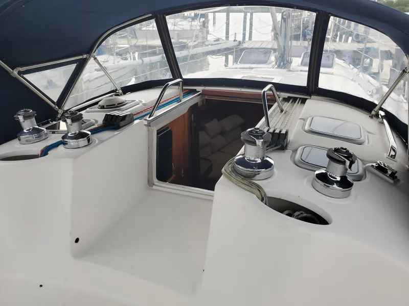 Slide: The Image of Cockpit of 2002 Hunter 380 sailboat with winches and navigation equipment. - 2