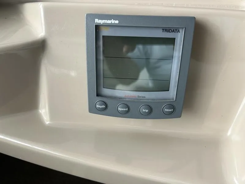 Slide: The Image of Raymarine Tridata display on 2005 Carver 396 AFT, showing depth, speed, trip, and reset buttons. - 12