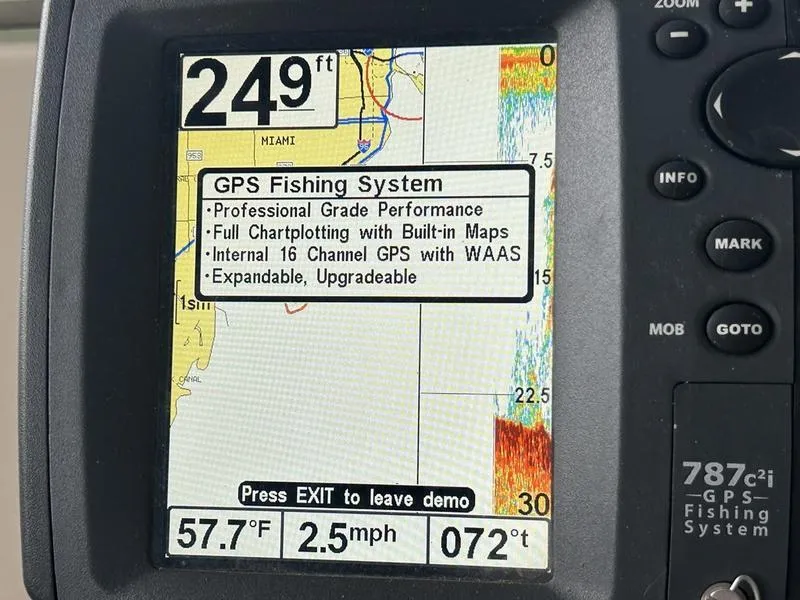Slide: The Image of GPS fishing system display on Carver 396 AFT, 2005 model, showing depth and map features. - 45