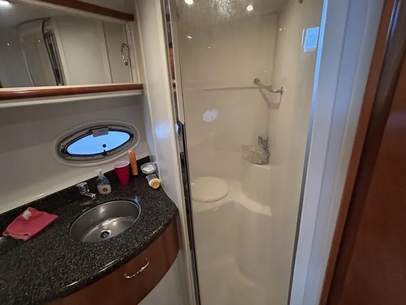 Slide: The Image of Bathroom interior of 2005 Carver 396 AFT yacht with sink and shower. - 20