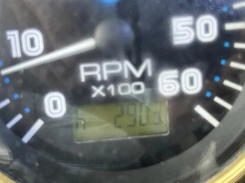 Slide: The Image of Close-up of a 2005 Carver 396 AFT tachometer showing 2903 RPM. - 41