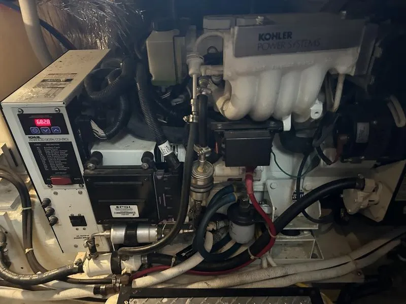 Slide: The Image of Engine room of a 2005 Carver 396 AFT with Kohler power system components. - 40