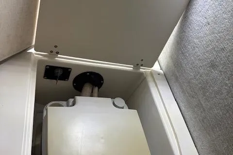 Slide: The Image of Interior compartment of a 1999 Boston Whaler Conquest 23 boat. - 9