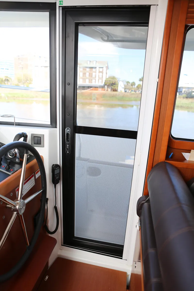 Slide: The Image of Starboard door at helm - 14