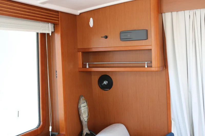 Slide: The Image of Starboard side salon storage and Fusion stereo - 15