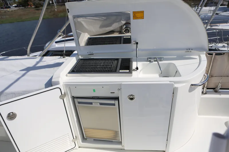 Slide: The Image of Flybridge galley w/electric grill, fridge, and sink - 30