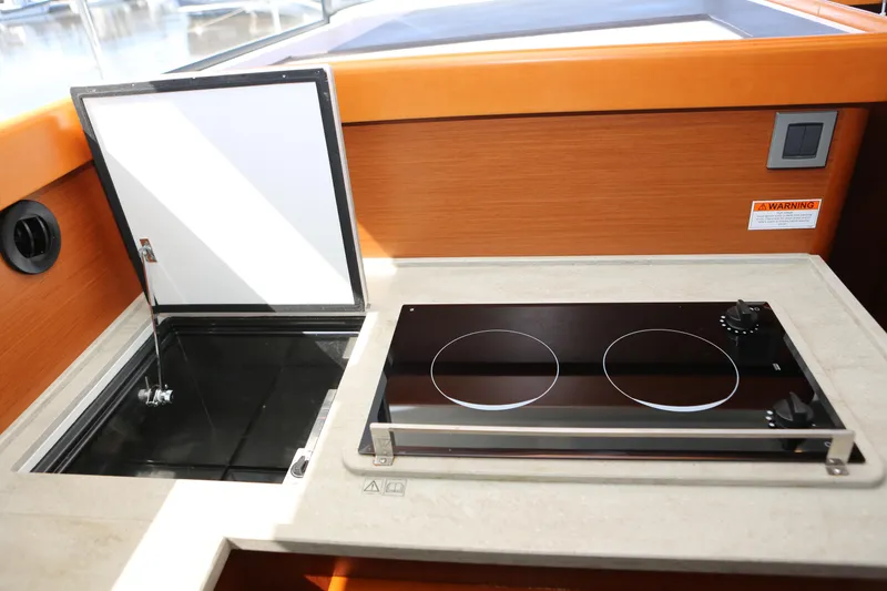 Slide: The Image of Electric stove and top loading freezer - 5