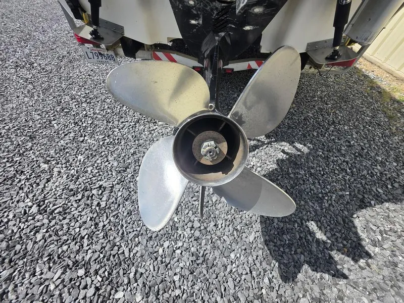 Slide: The Image of Propeller of 2008 Blazer Bay 2420 Professional boat on gravel surface. - 18