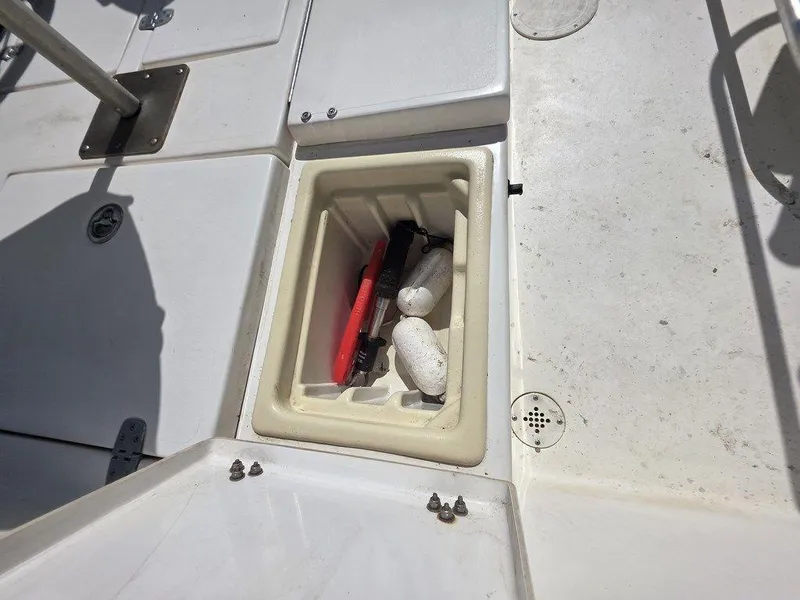 Slide: The Image of Storage compartment on 2008 Blazer Bay 2420 Professional boat deck. - 19