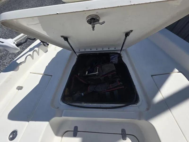 Slide: The Image of Open storage compartment on 2008 Blazer Bay 2420 Professional boat deck. - 31
