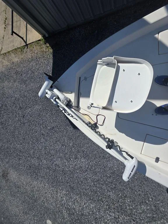 Slide: The Image of 2008 Blazer Bay 2420 Professional boat with trolling motor and seat on deck. - 33