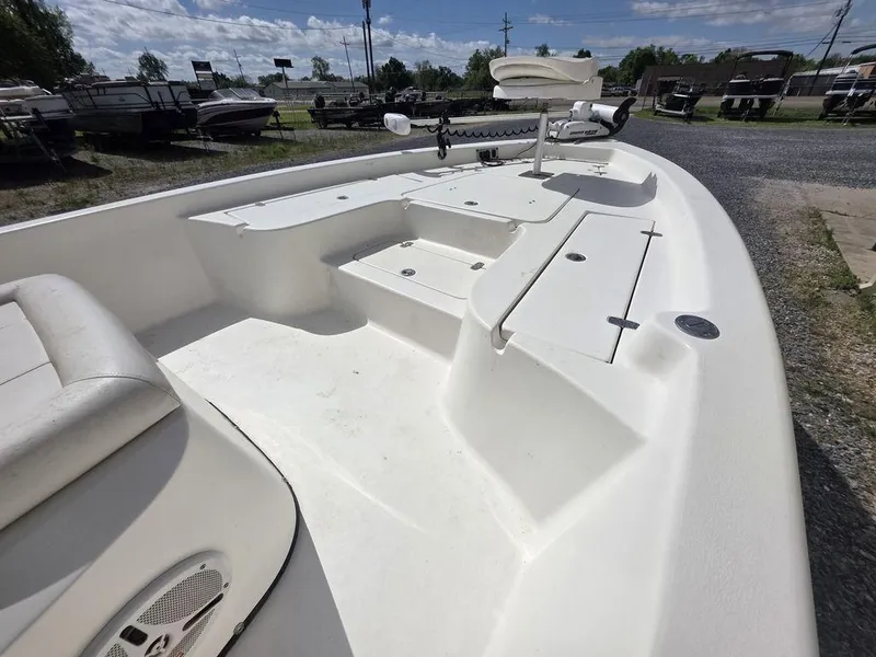 Slide: The Image of 2008 Blazer Bay 2420 Professional boat deck with storage compartments and seating. - 9