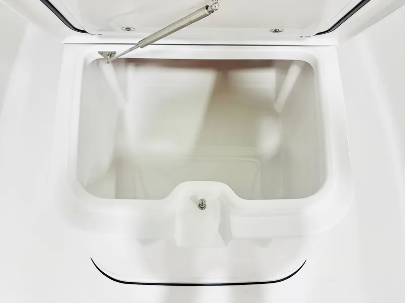 Slide: The Image of Open storage compartment on 2025 Sportsman Masters 247OE Bay Boat. - 10