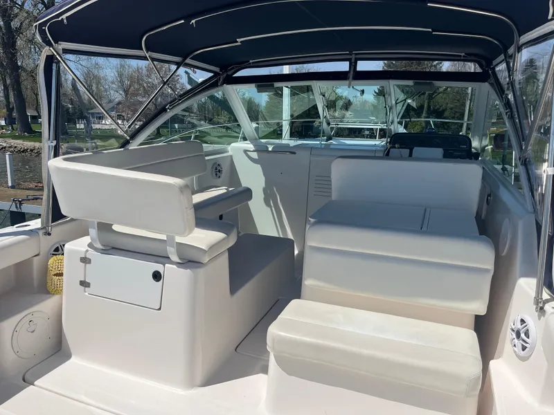 Slide: The Image of 2007 Tiara Yachts 2900 Coronet interior with seating and canopy, showcasing luxury design. - 11