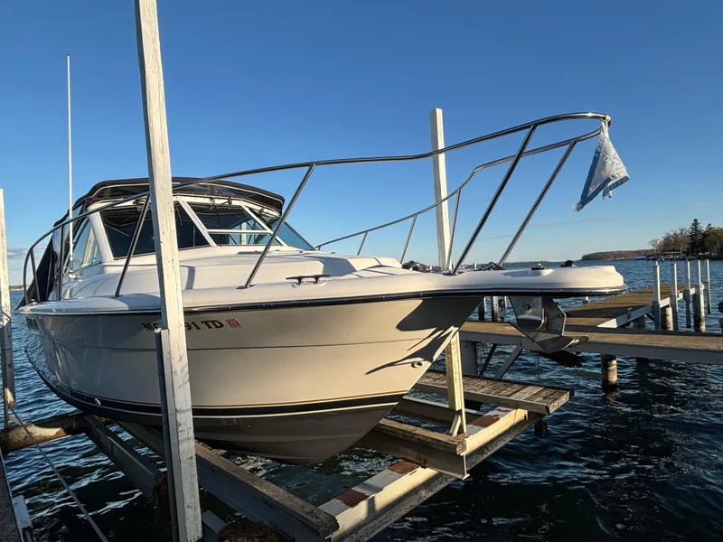 Slide: The Image of 2007 Tiara Yachts 2900 Coronet docked on a sunny day. - 2