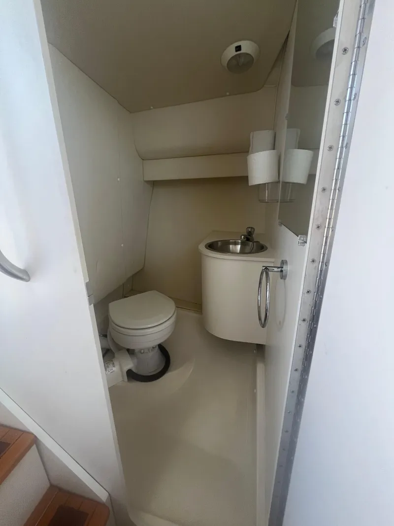 Slide: The Image of 2007 Tiara Yachts 2900 Coronet bathroom with toilet and sink. - 34