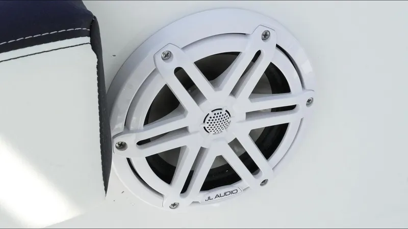 Slide: The Image of White JL Audio speaker on 2025 Tidewater 220 LXF boat. - 19