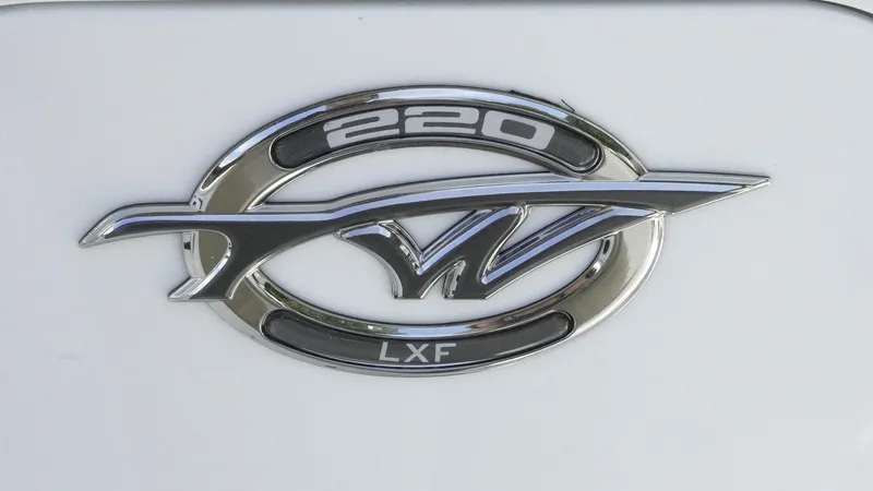 Slide: The Image of Tidewater 220 LXF 2025 logo on white background, featuring sleek chrome design. - 21