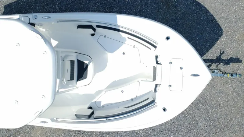 Slide: The Image of 2025 Tidewater 220 LXF boat, aerial view, showcasing sleek design and spacious deck layout. - 7