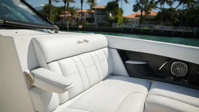 Slide: The Image of Luxurious seating on 2015 Sea Ray 350 SLX boat with waterfront view. - 28