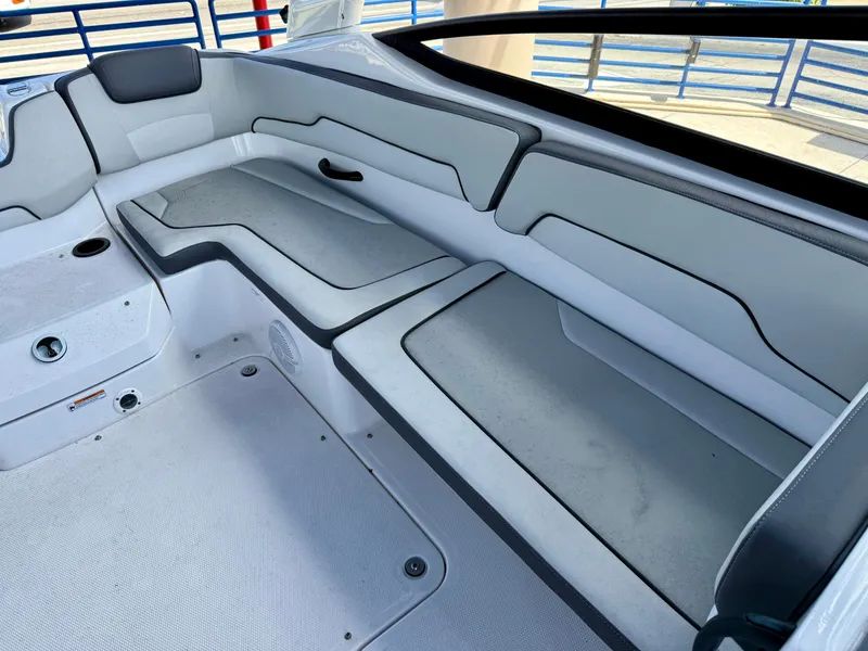 Slide: The Image of 2025 Yamaha Boats AR190 interior seating with modern gray upholstery. - 9