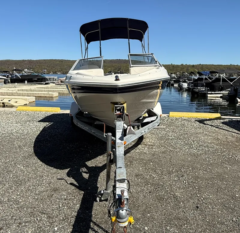 Slide: The Image of Azure AZ188 boat on trailer by a lake, sunny day, 2006 model. - 3