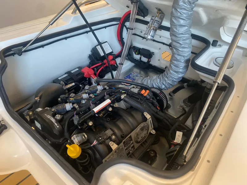 Slide: The Image of Engine compartment of 2024 AB Inflatables ABJET 290, showcasing detailed mechanical components. - 10