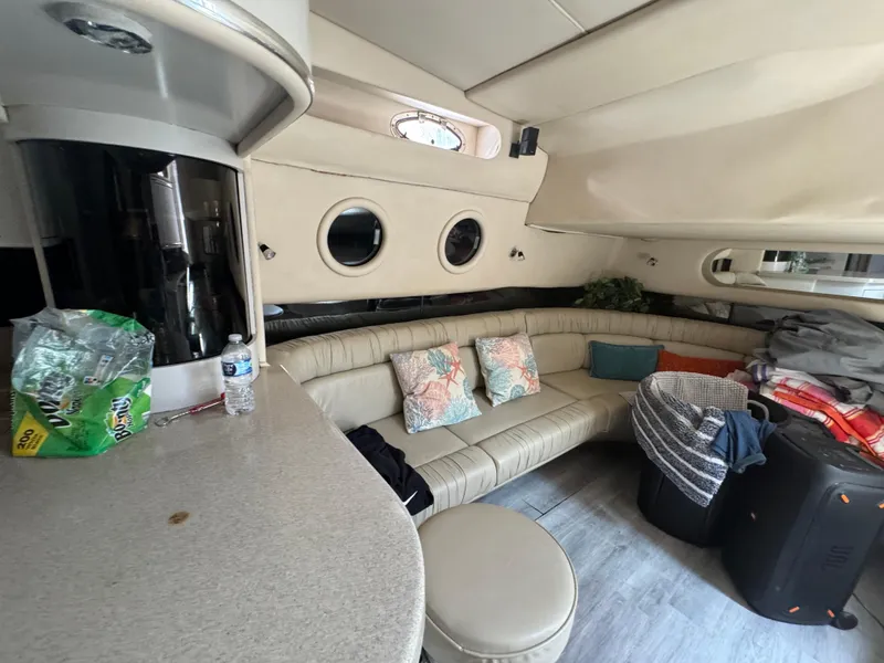 Slide: The Image of Interior of 1999 Sea Ray Sundancer 50 yacht with beige seating and modern decor. - 39