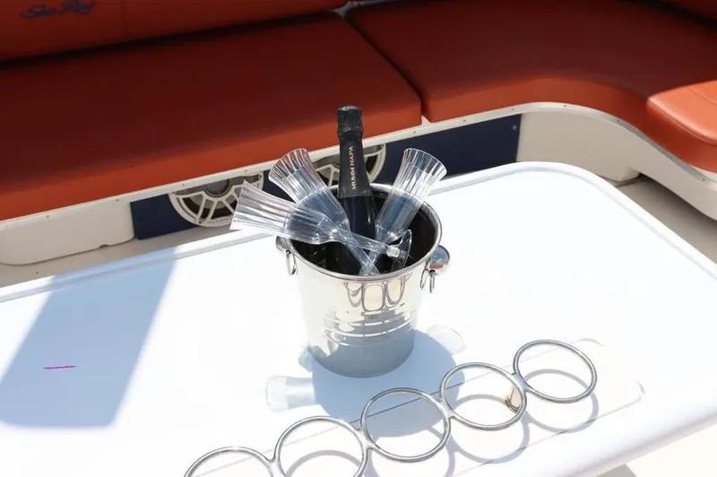 Slide: The Image of Champagne bucket with glasses on Sea Ray Sundancer 50 yacht table, 1999 model. - 6