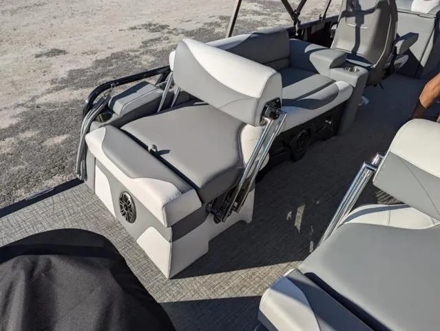 Slide: The Image of 2025 Avalon LSZ Quad Lounge Switch 2385 interior with gray seating and speaker system. - 18