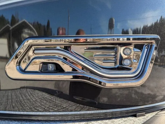 Slide: The Image of 2025 Avalon LSZ QUAD LOUNGE SWITCH 2385, sleek chrome detail on exterior. - 21