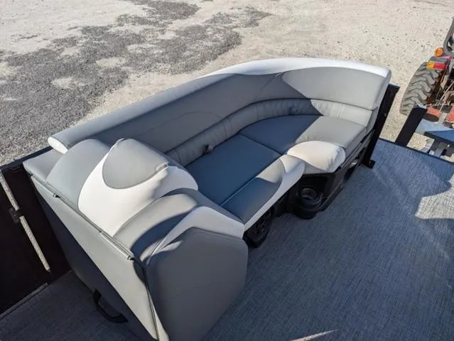 Slide: The Image of 2025 Avalon LSZ Quad Lounge Switch 2385 with luxurious gray seating on a boat deck. - 9
