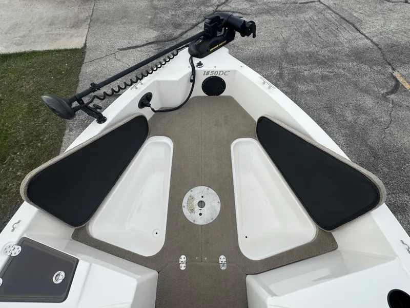 Slide: The Image of 2011 FinCraft 1850 boat deck with seating and trolling motor. - 10