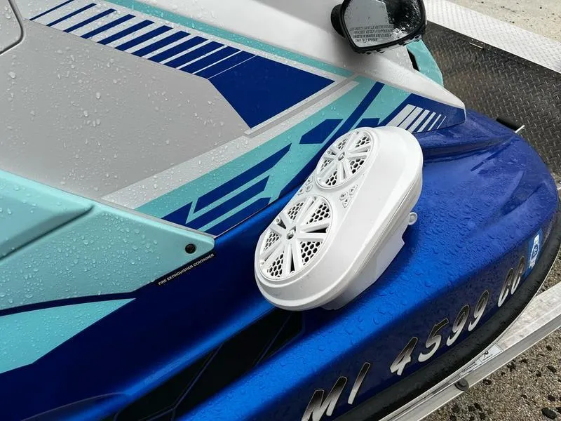 Slide: The Image of 2022 Yamaha WaveRunner EX LIMITED GP 1800 with sleek blue design and speaker system. - 11