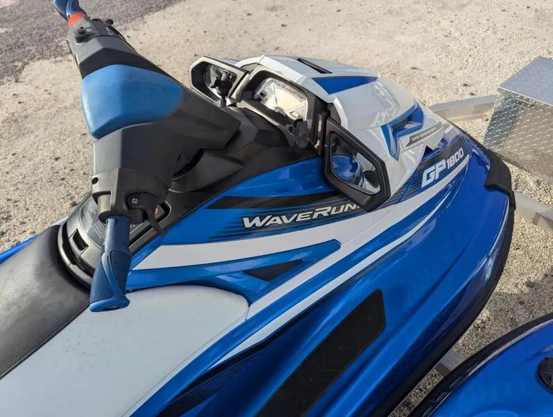 Slide: The Image of 2022 Yamaha WaveRunner EX LIMITED GP 1800, blue and white jet ski, close-up view. - 19